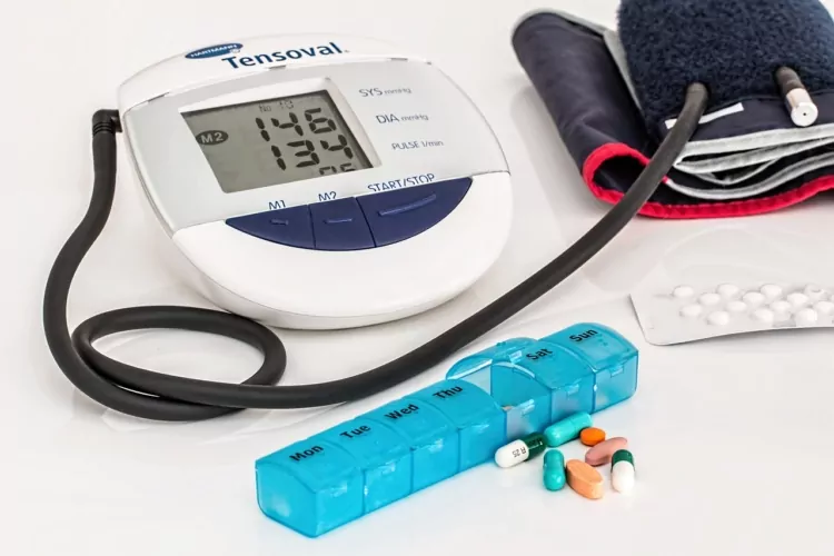 Hypertension tablets and blood pressure cuff